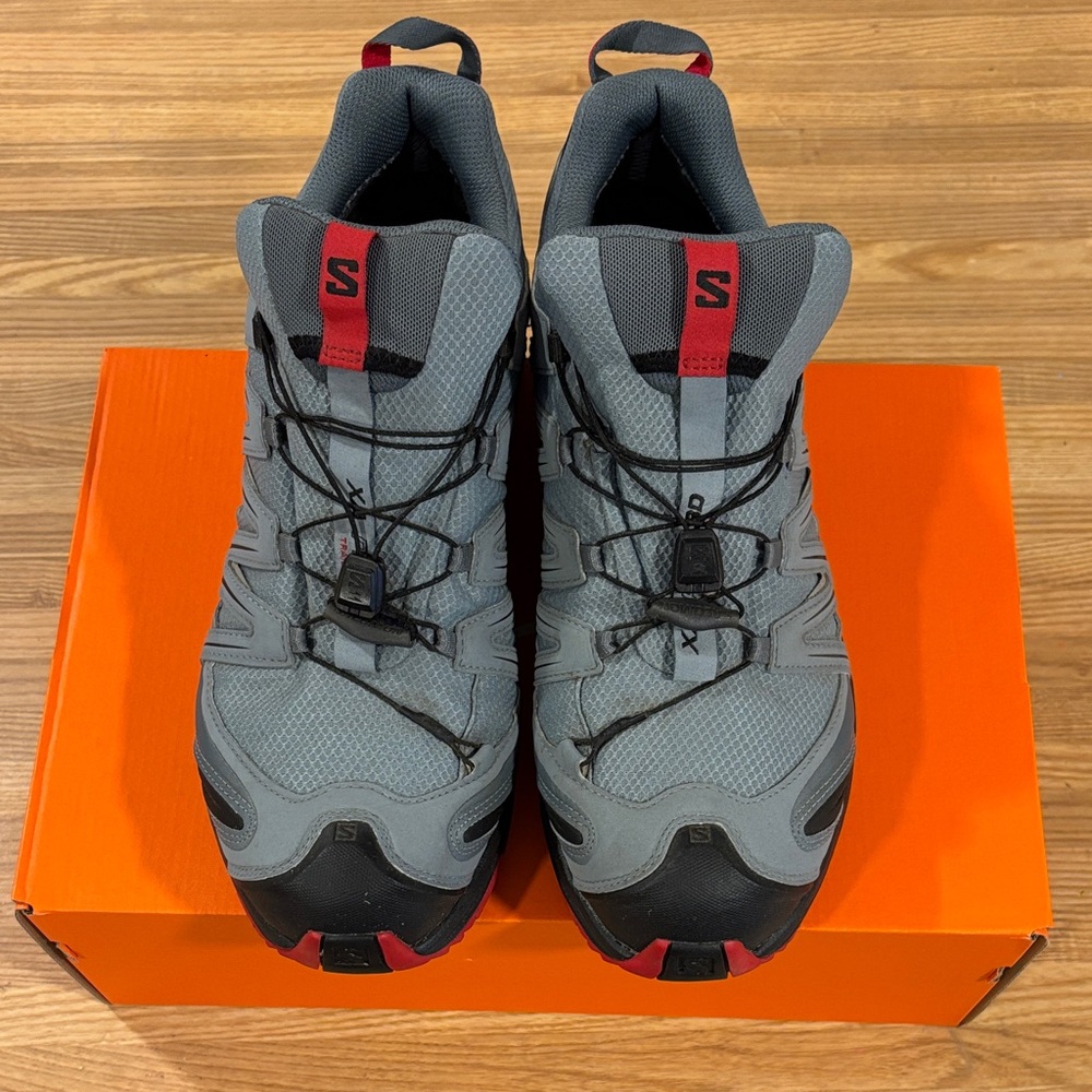 Salomon Grey and Black Trail Sneakers with Red Accents - Picture 6 of 7